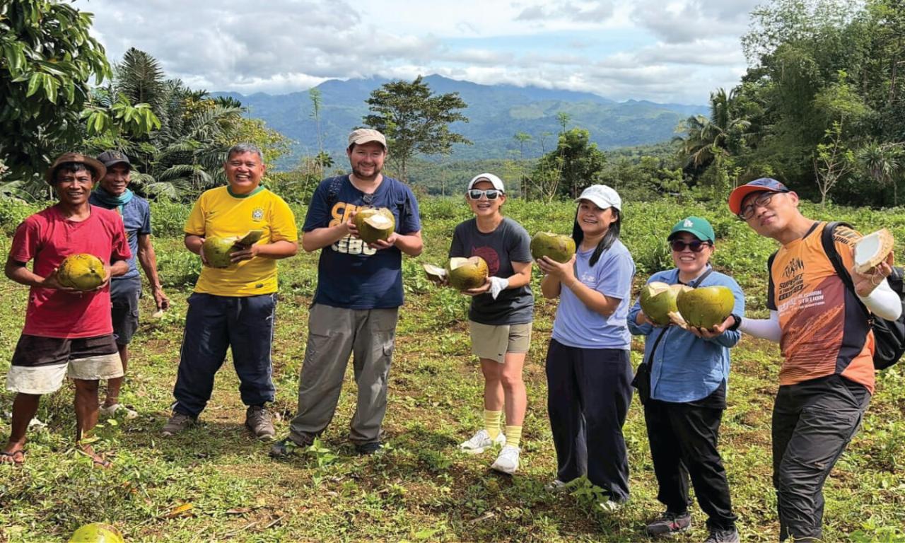 Jao Resari visiting the Reforestation Project, Bantolinao Farm, with fellow Columban missionaries and local farmers
