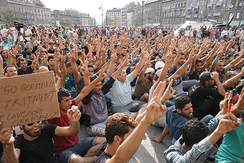 Syrian refugees strike in front of Budapest Keleti railway station. Refugee crisis. Budapest, Hungary, Central Europe, 3 September 2015. Author: Mstyslav Chernov. Wikimedia Creative Commons.