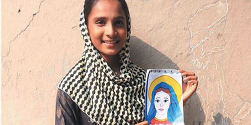 Alishba holds her drawing of Mama Mary - Photo: Hazel Angwani