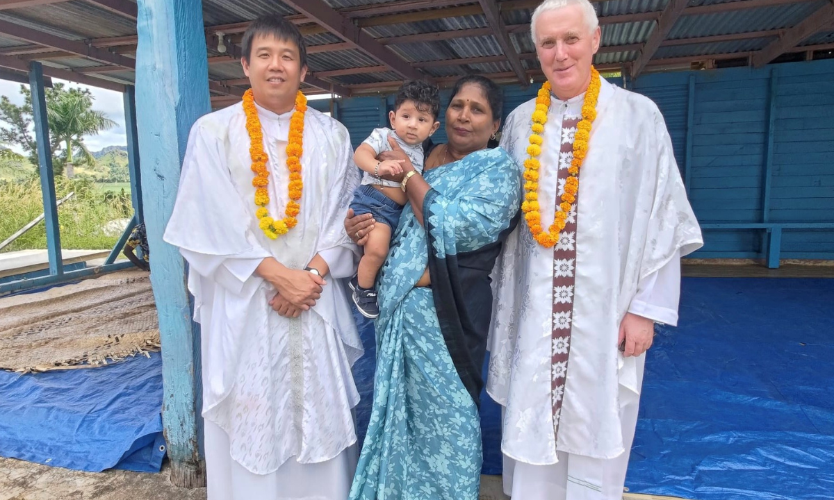 An Indian-Fijian mother and her son with Fr. Carlo Jung Euikyun and Fr. Tim Mulroy in Naleba Village –  part of Holy Family Parish, Labasa - Photo: Fr Tim Mulroy