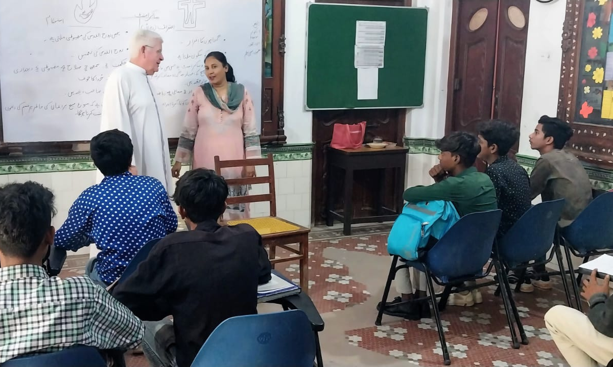 Columban Fr Robert McCulloch with a teacher at the Catholic Centre for Academic Excellence - Photo: Fr Robert McCulloch
