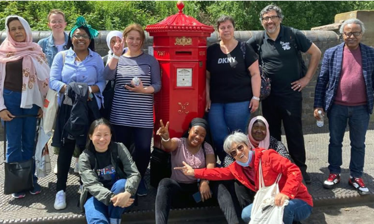 Lay Missionary Nathalie Marytsch and her husband Mauricio (right of postbox) - Photo: Nathalie Marytsch 