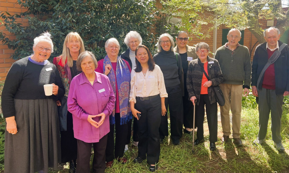 Cheryl (center) stands surrounded by participants of the round-table, many of whom have been involved in ecological justice work over many years for the Catholic Church and Catholic organisations. - Photo:  Mariana Waqa