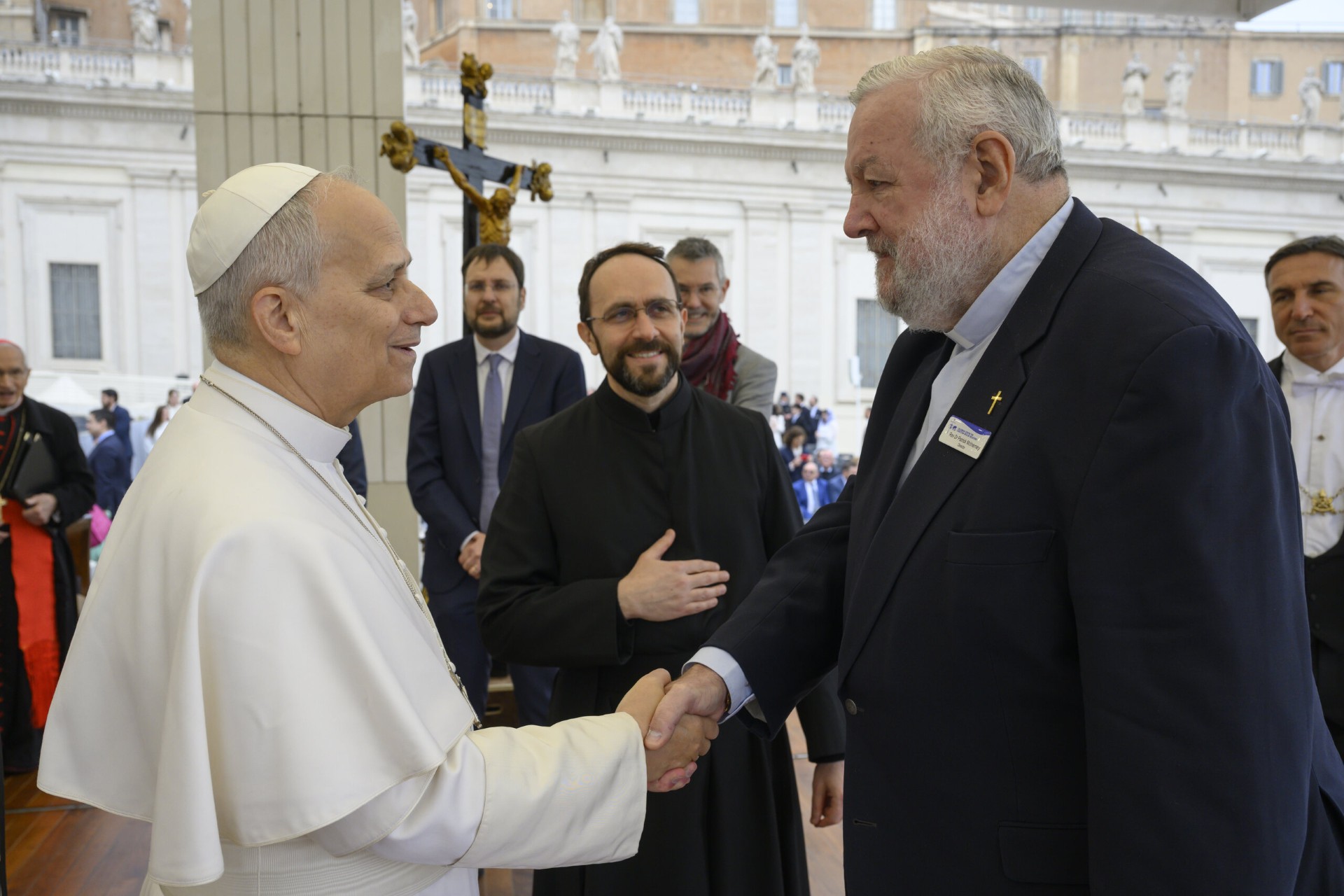 Pope Leo XIV greets Columban Fr Patrick McInerney during their meeting. Photo: Vatican Media