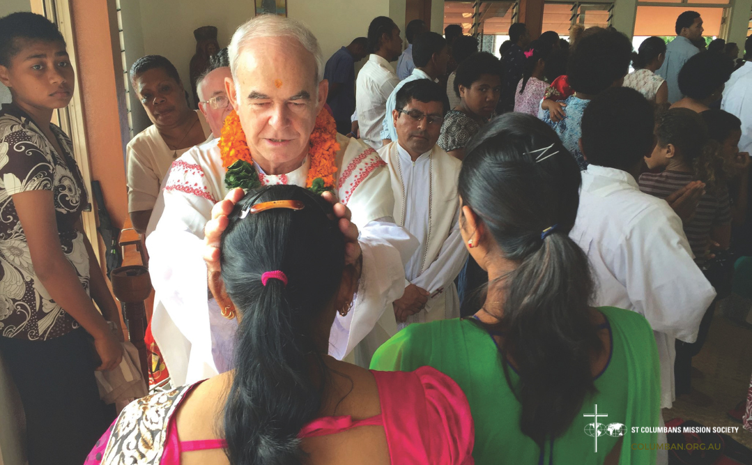 Columban Fr Frank Hoare guiding the people in Fiji.  Photo: Fr Frank Hoare