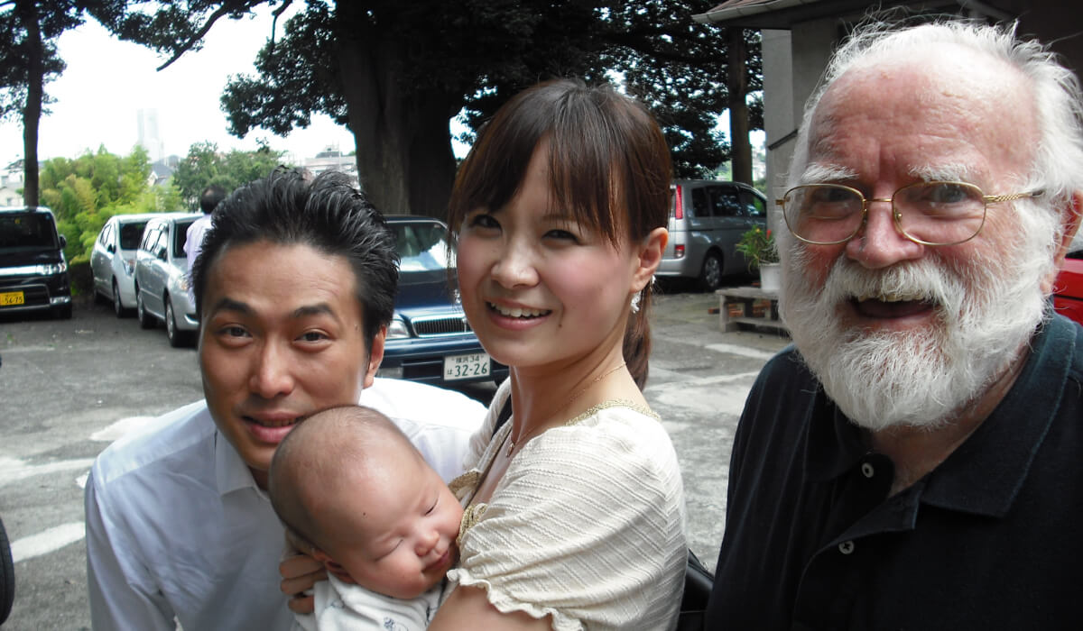 Columban Fr Barry Cairns [right] with a family Japan. Photo: Fr Barry Cairns