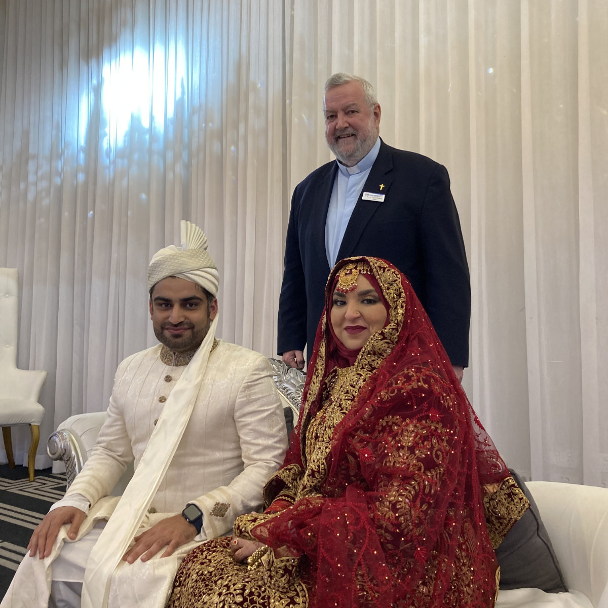 Fr Patrick with Waseem Ahmad and Mobinah Ahmad. Photo: Rev Dr Patrick McInerney 