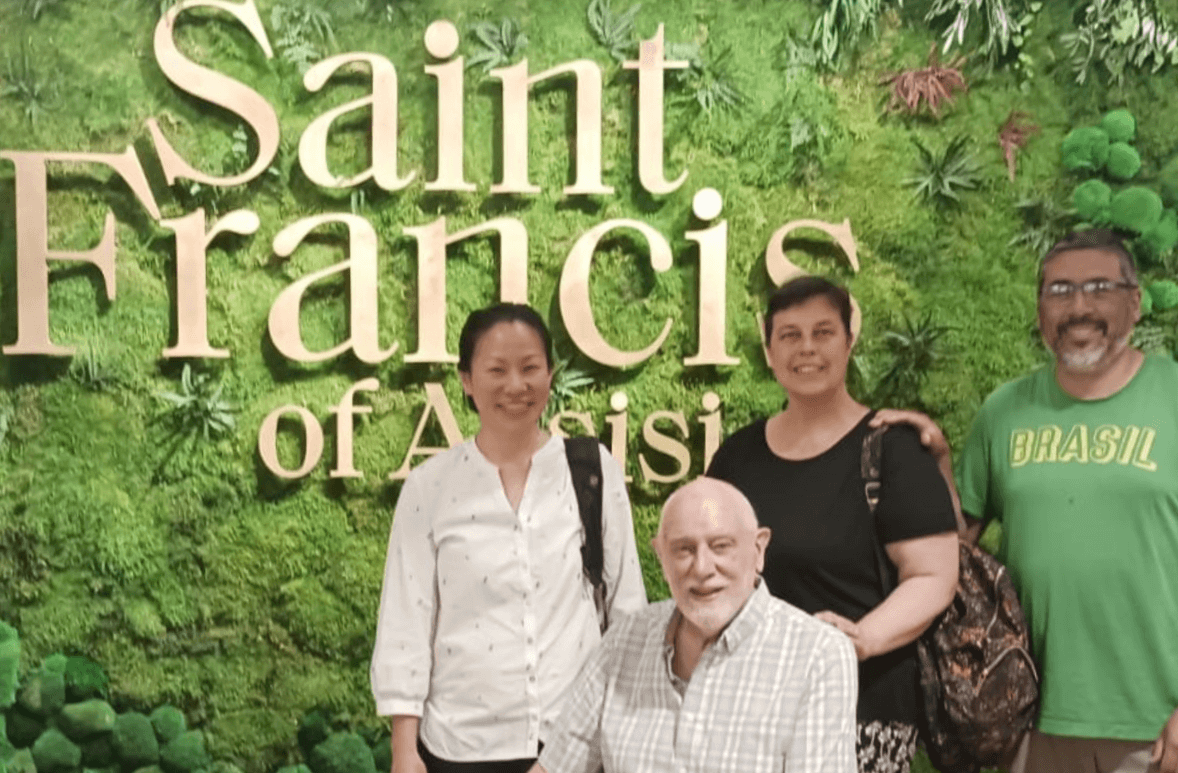 Columban team: Teresa Chuah, Nathalie Marytch, Mauricio Silva and Fr Ray Collier SSC at the exhibition. 