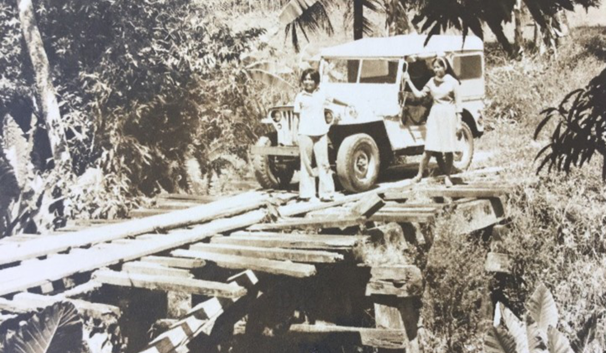 Tricky Bridge: Sr Julpha Meron and Noni Wong of the Mercy Mobile Heath Team confront a tricky bridge on their way to one of the barrios of Maranding