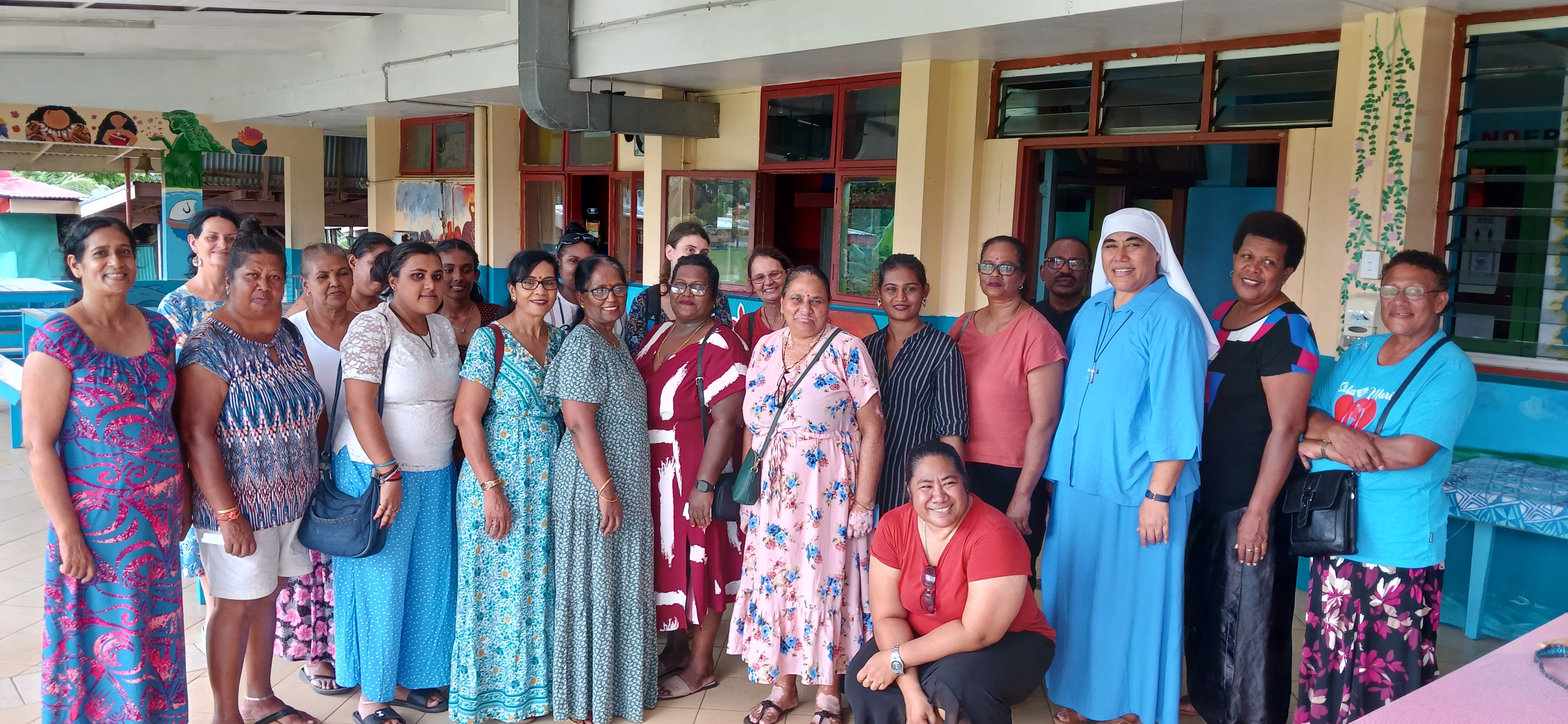 Pescilla Magdalin (far left) with members of the women’s interfaith group visiting St Christopher’s Orphanage.