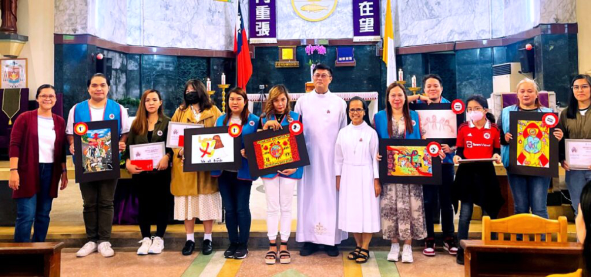 Jao Resari (left) with the winners of the second art competition for World AIDS Day. Photo: Missionary Society of St. Columban | Philippines