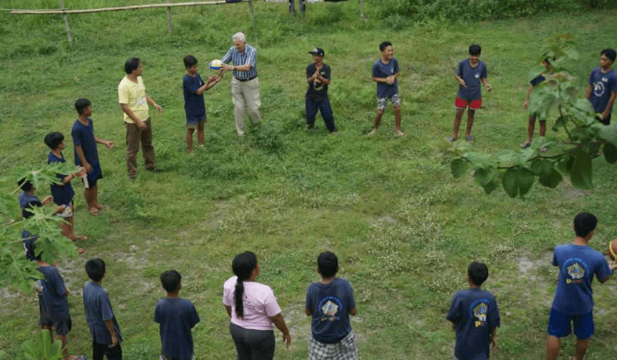 Fr Shay engage in activities with children at Preda house. Photo: Preda Foundation Inc.