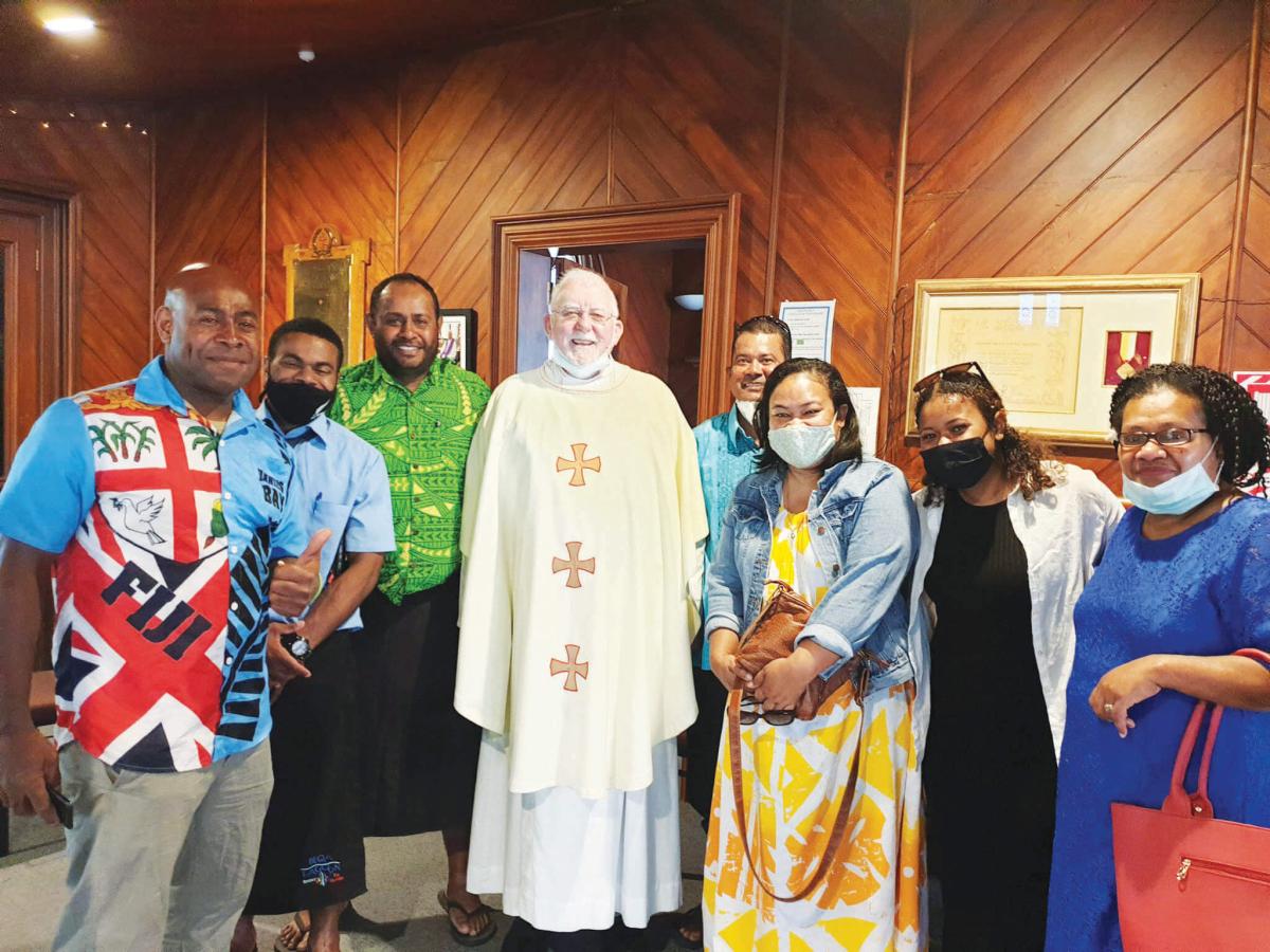 Columban Fr Tom Rouse with parishioners after Sunday Mass in New Zealand. Photo:St Columbans Mission Society