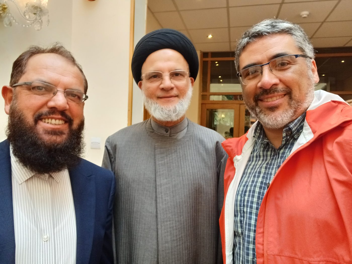 Mauricio Silva (right) with Muslim leaders, Shi'a and Sunny