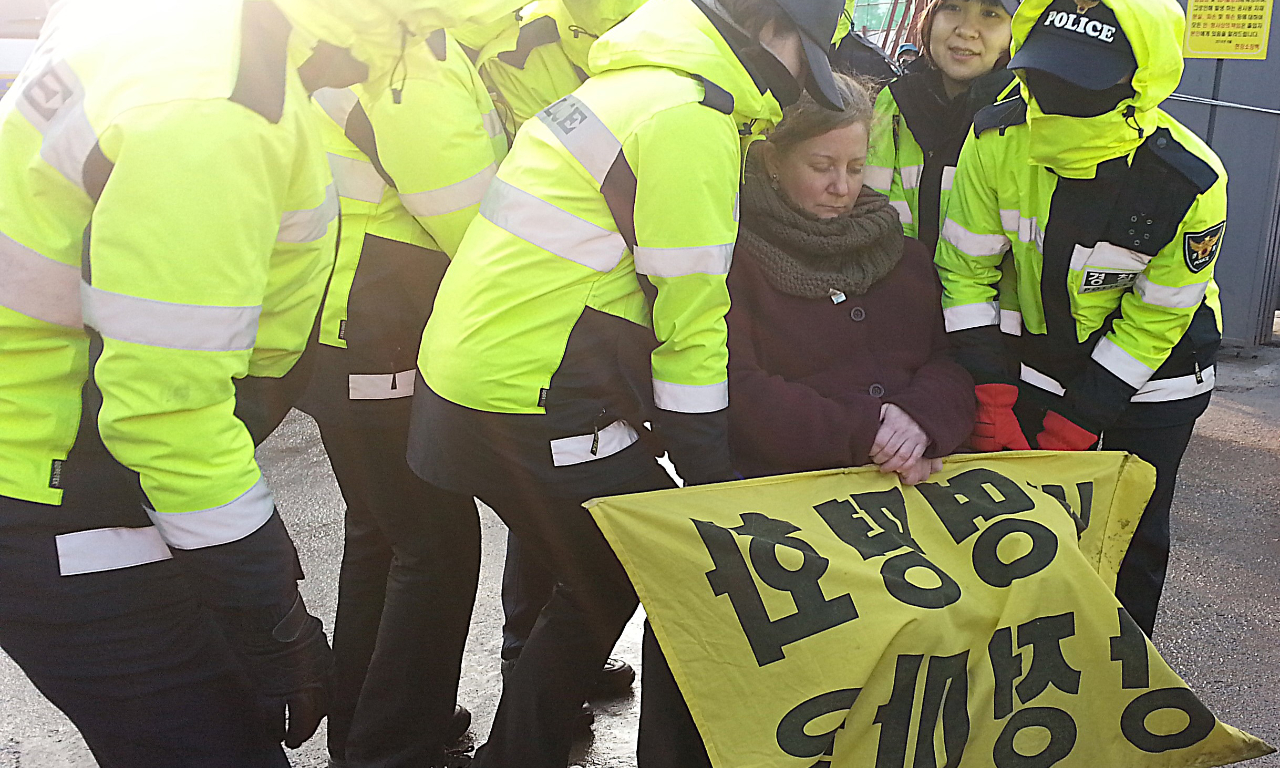 On Jeju Island (Korea), partaking alongside locals in a non-violent civil disobedience protest of a military base