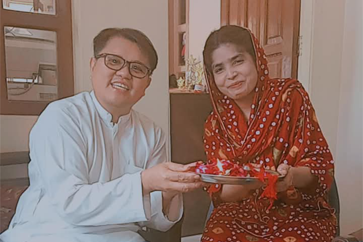 Miss Amrita and Fr Elbert hold the Arte plate as the rituals begin. Photo: Fr Elbert Balbastro
