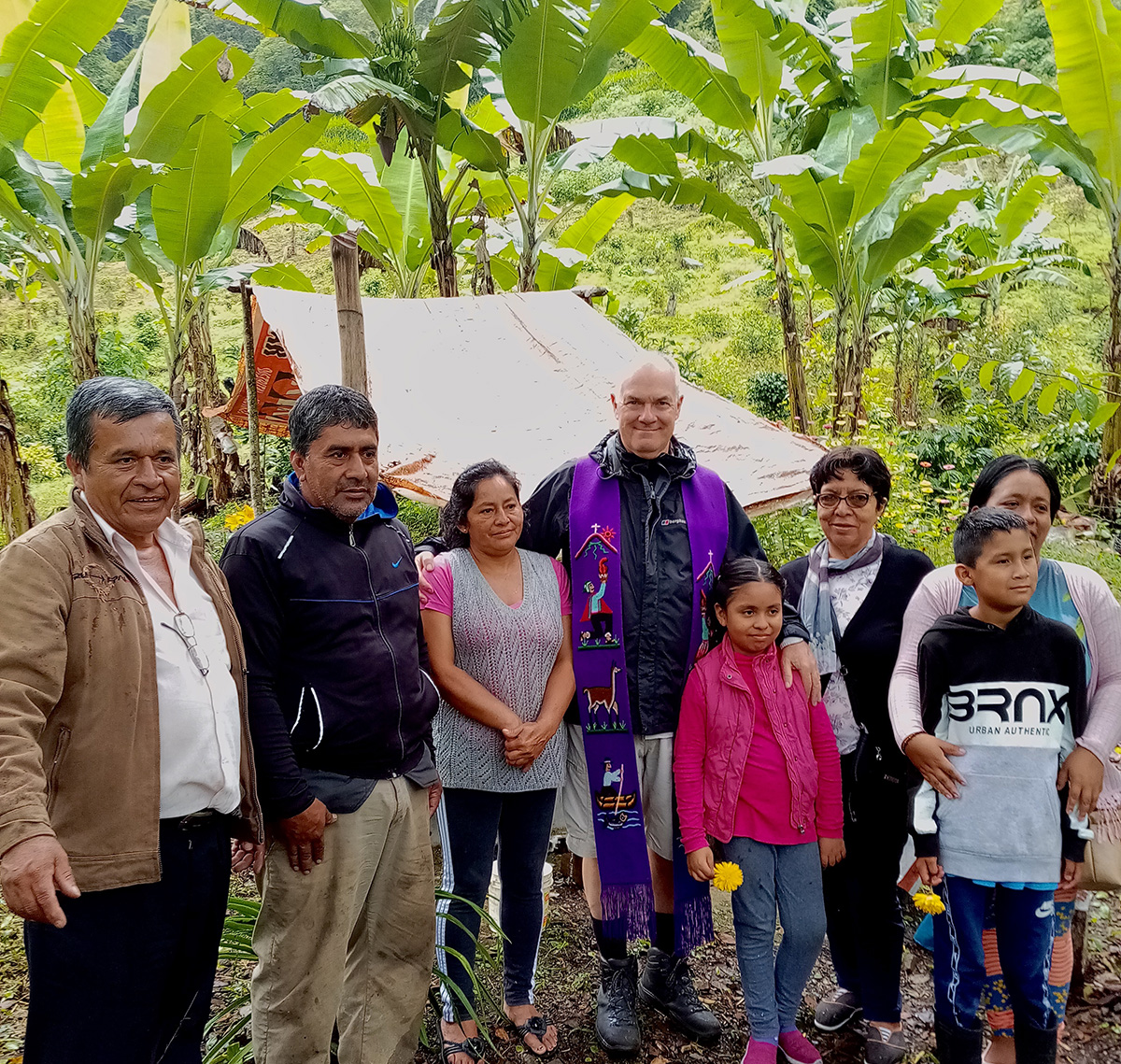 Fr John Boles SSC with people in and around Monobamba after liturgies. Photo: Fr John Boles SSC