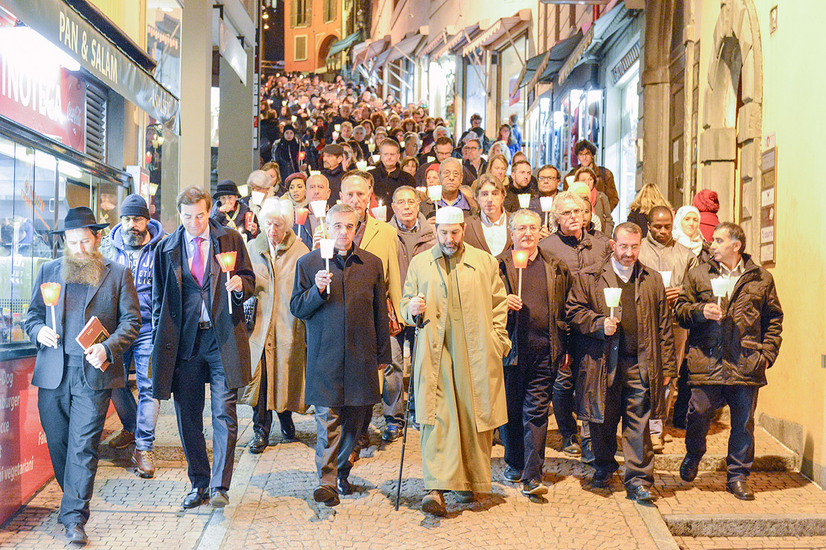 Group of people during the interfaith procession against terrorism in the streets of Lugano, Switzerland. Photo: bigstockphoto.com/Fotoember