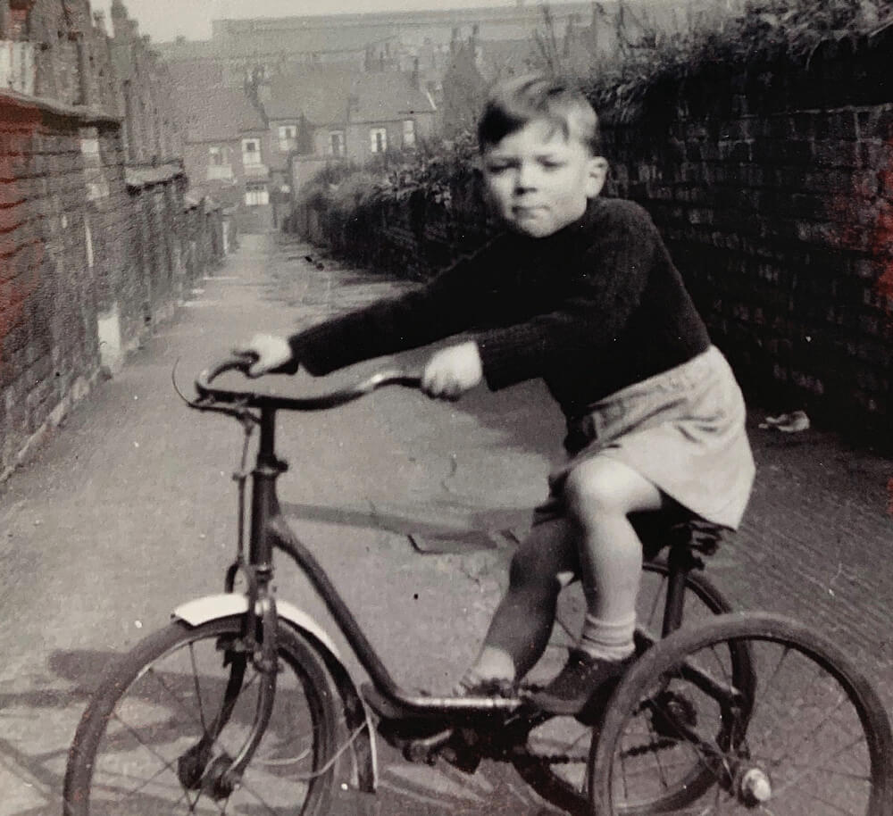 John Boles playing in the back-streets of Manchester in 1957. Photo: Fr John Boles SSC