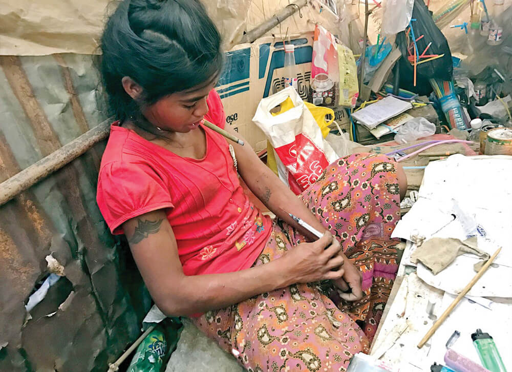 A young Burmese woman with an addiction to drugs.