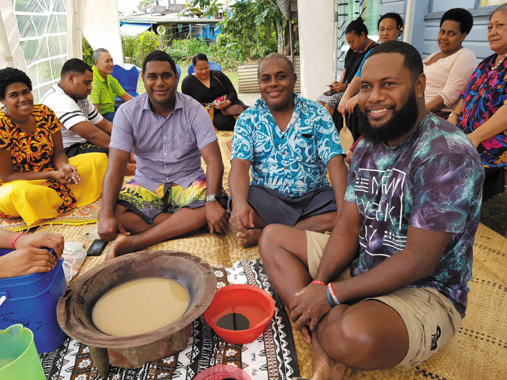 Parishioners in Fiji sitting around the yaqona bowl. Photo: Fr Pat Raleigh SSC
