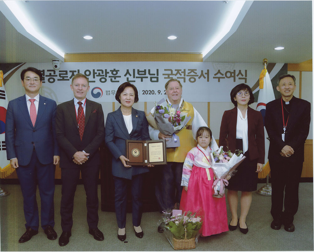Columban Fr Bob Brennan after receiving his Honorary. Photo: Fr Bob Brennan SSC Korean Citizenship, alongside Korean Justice Minister Choo Miae (left). 