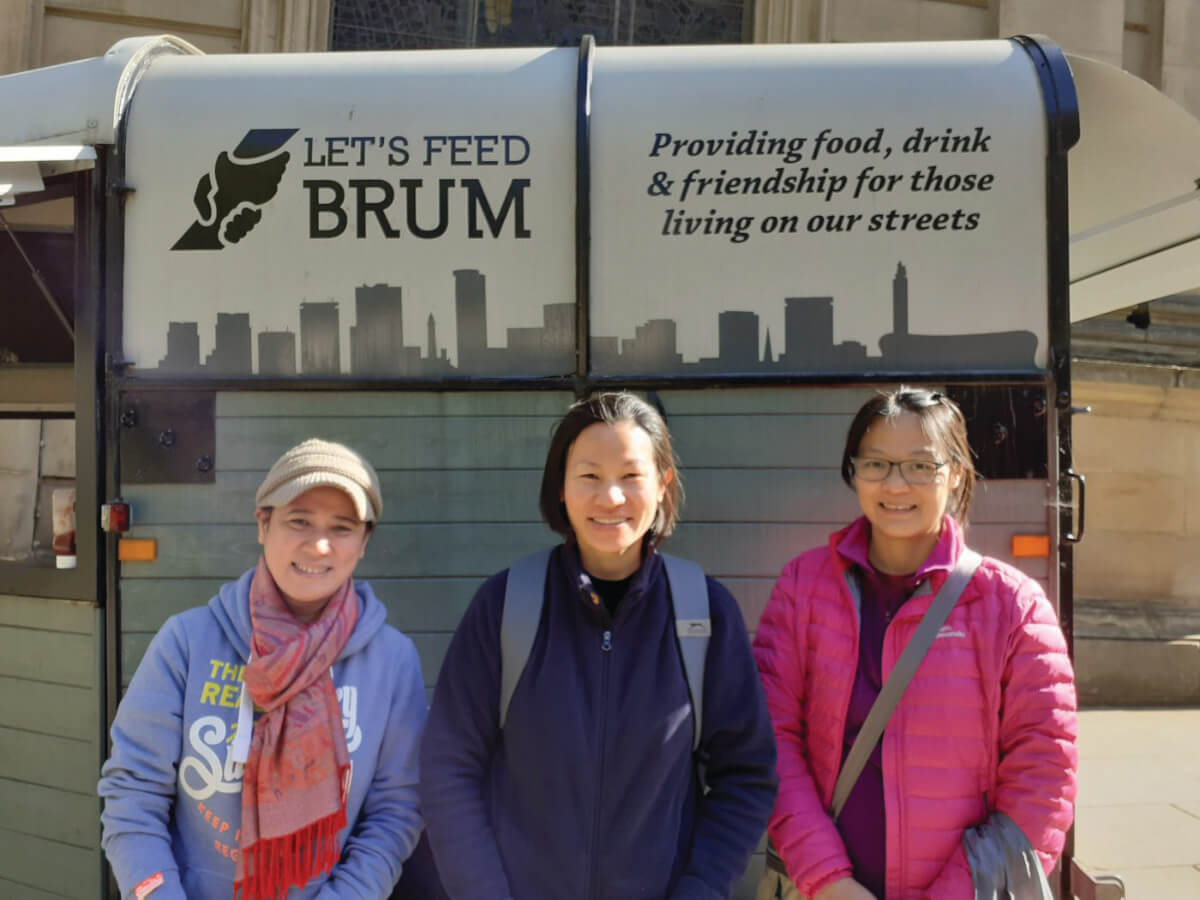 Columban Lay Missionaries Teresa Hui Ling-chuah (centre) & Sophia Ting Chee-tzu (right) working with 'Lets feed Brum' charity. Photo: Columban Lay Missionaries