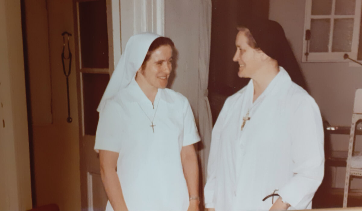 Columban Sr Mary Greaney (left) speaking with Columban Sr Mary Aquinas Monahan (right), who was the Medical Director at Ruttonjee  Sanatorium for almost 40 years. The Columban sisters were responsible for the administration of the sanatorium as well as running nursing school. The sanatorium was also a teaching hospital for medical students. File photo: St Columbans Mission Society