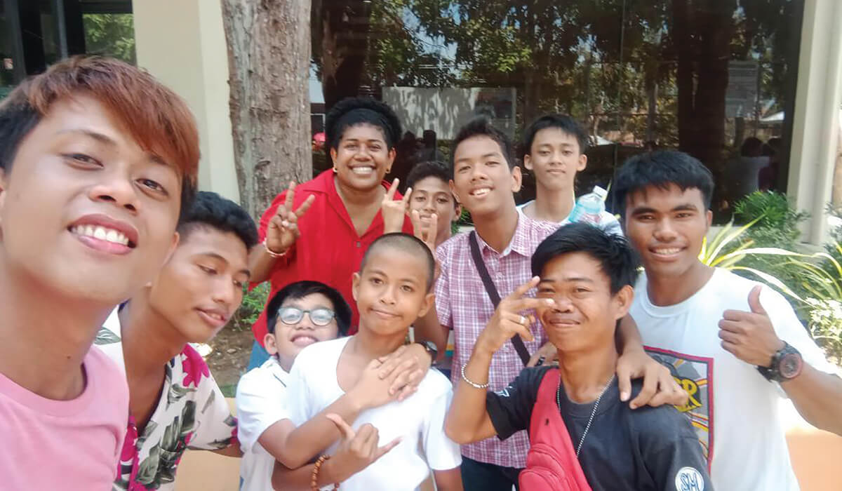 Lanieta with the hearing impaired students among whom she works in the Philippines. Photo: Lanieta Tamatawale