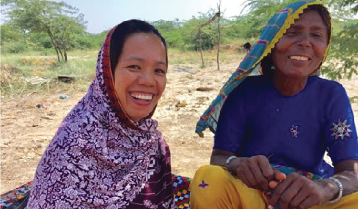 Mona (left) with a woman from the village. Photos: Monalisa Esteban