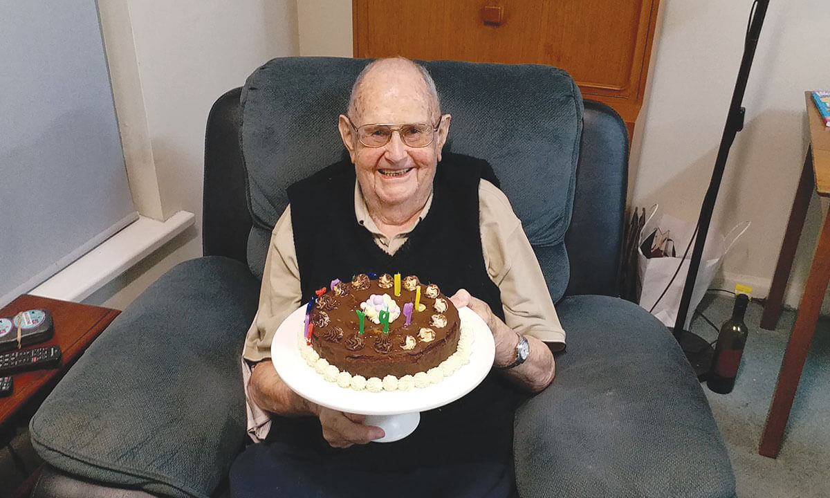 Fr Bill Moran celebrating his 86th Birthday on May 15, 2022 in his room at the Columban House in Essendon. - Photo: St Columbans Mission Society