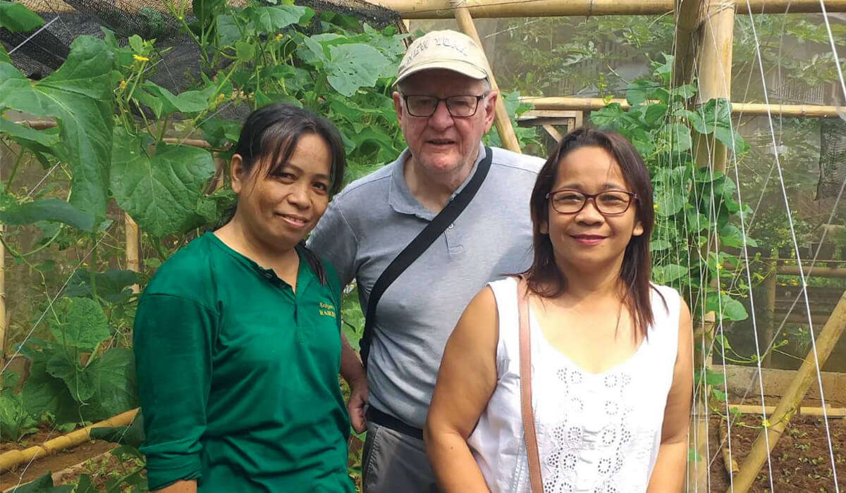 Fr Oliver McCrossan (centre) with the mother of Jenneth Zenaida Ewayan (left) and Virgie Vidad (right) in the Philippines. - Photo: Virgie Vidad
