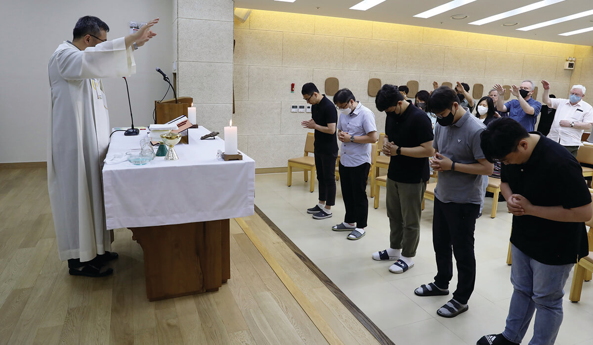 Columban seminarian Laurencio Woobin Lee is missioned overseas by Regional Director Fr Seo Kyunghi Stephen, Columban Formation house, Seoul, Korea. - Photos: Sarah MacDonald