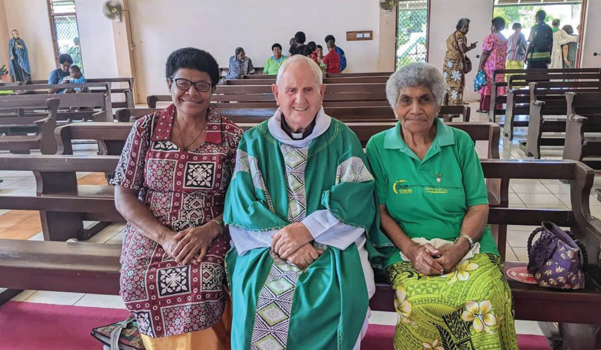 Columban Fr Donal McIlraith with Sisi and a fellow parishioner. - Photo: Fr Pat Colgan
