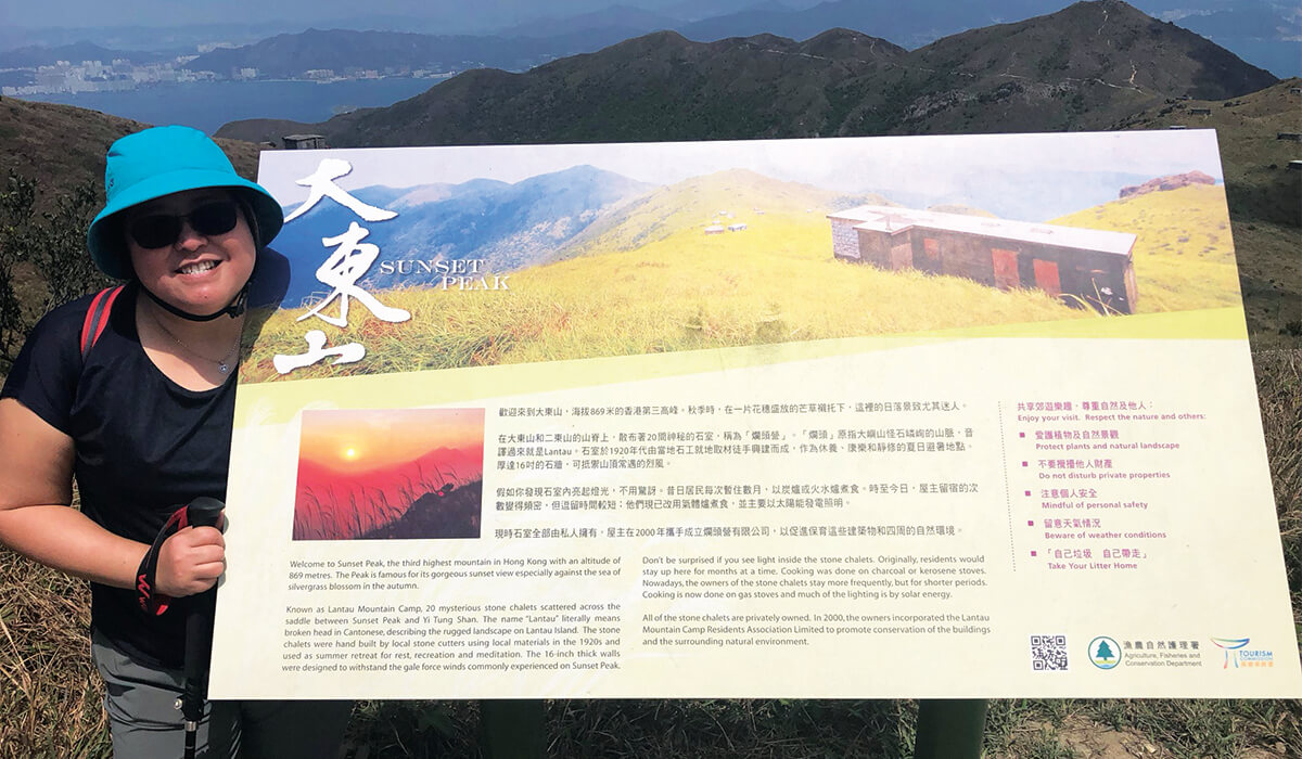 Columban Lay Missionary, Vida Hequilan, having scaled 869 meters, enjoys the view from Sunset Peak, Hong Kong. - Photo: Fr Tim Mulroy