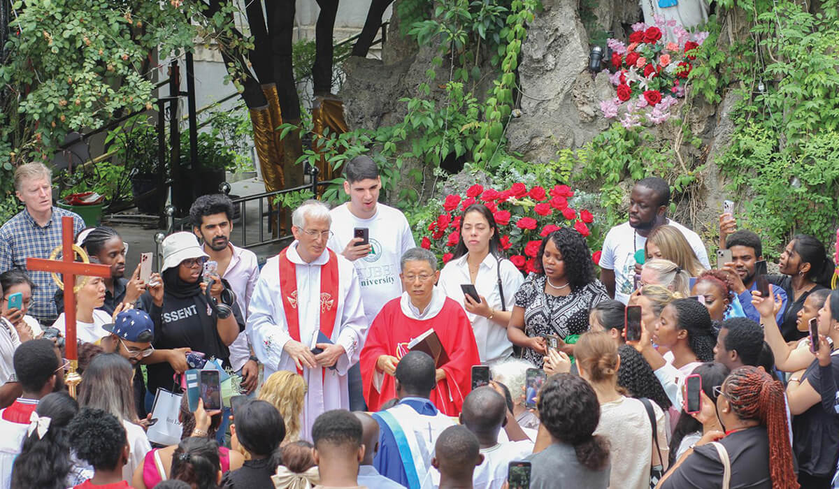 Columbans Fr Kevin O’Neill (far left) and Fr Dan Troy (centre left) are with Fr Joseph Peng and the international community to watch the doves take flight. - Photo: Fr Kevin O'Neill