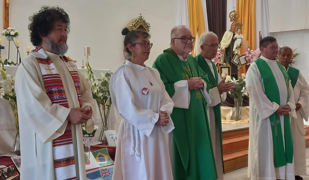 Fr Dan Harding (centre) together with fellow Columbans, a parish female lay minister (left) and permanent deacon (right). - Photo: Fr Dan Harding