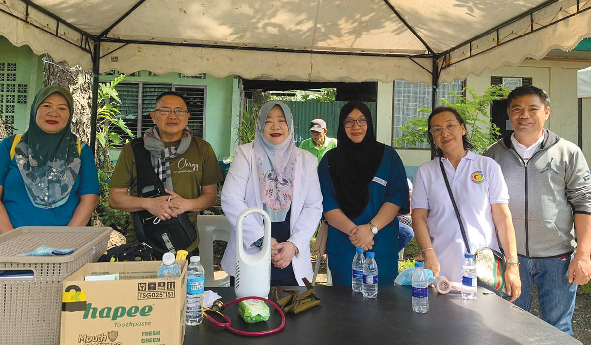 Fr Ramon Torres (second from left) and Alito Delos Santos (far right) with Muslim women doctors and members of the medical mission team - Photo: Alito Delos Santos