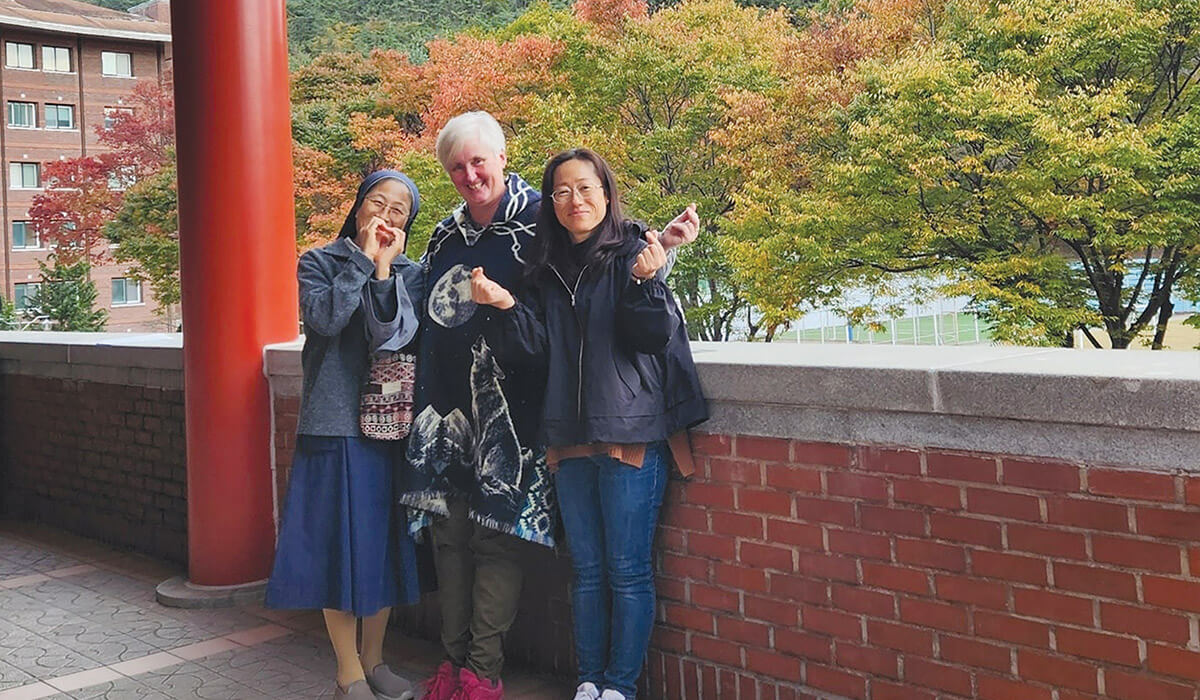 Chrissie Fitzpatrick (centre) with former Columban lay missionaries Victoria Cho Puni (left) and Emanuella Kim Hyunsook (right). Photo: Chrissie Fitzpatrick