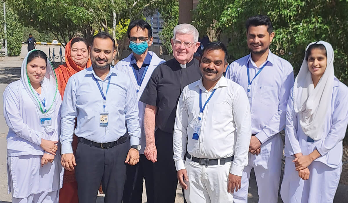 Eric Siraj, administrator (second from the left), Columban Fr Robert McCulloch (centre) amongst the staff at St Elizabeth's Hospital in Pakistan. - Photo: Fr Robert McCulloch