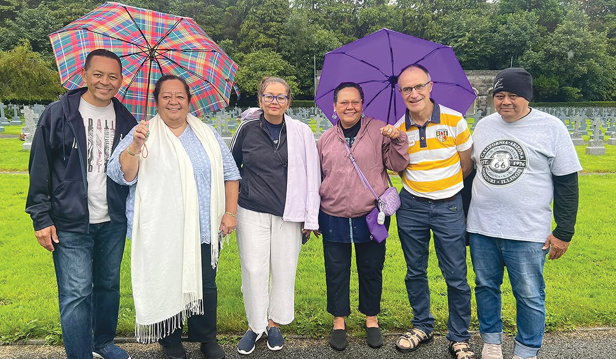 Columban Fr Pat Colgan along with the Chute family at grave of Columban Fr Dick O'Sullivan. - Photo: Fr Pat Colgan