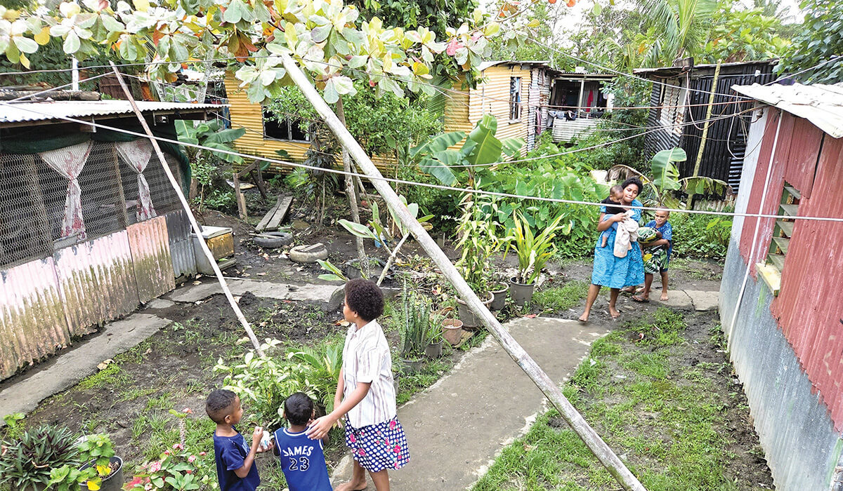 Electric wires criss-cross the homes of Nanuku, an informal settlement in Suva, Fiji. - Photo: Fr Frank Hoare SSC