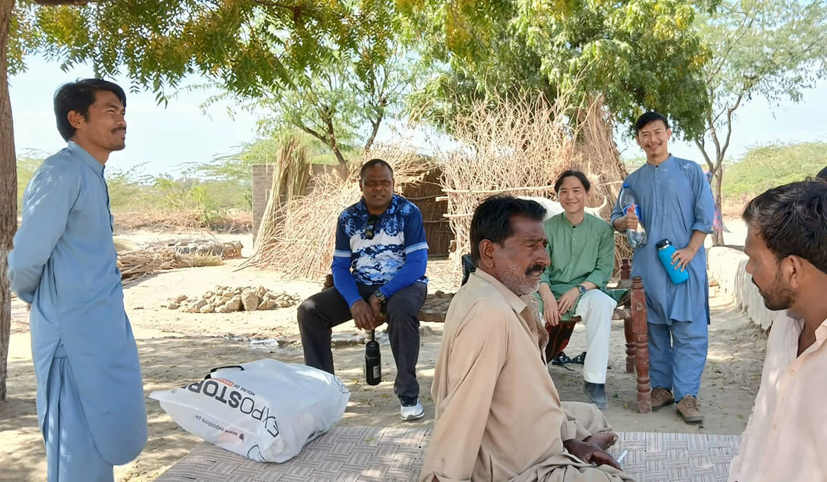 Columban student Jinwook Kim visits an isolated village in the interior of Sindh, where Hindus and Christians live side by side in harmony with fellow Columbans, Frs Iowane Naio (seated on the left), Jerry Lohera (standing on the left side) and Columban student Zau Mai Peter (standing on the right). Photo: Jinwook Kim